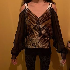 Selling Jean Paul Gaultier top.